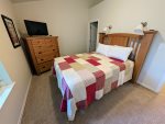 Master bedroom with queen-size bed.
